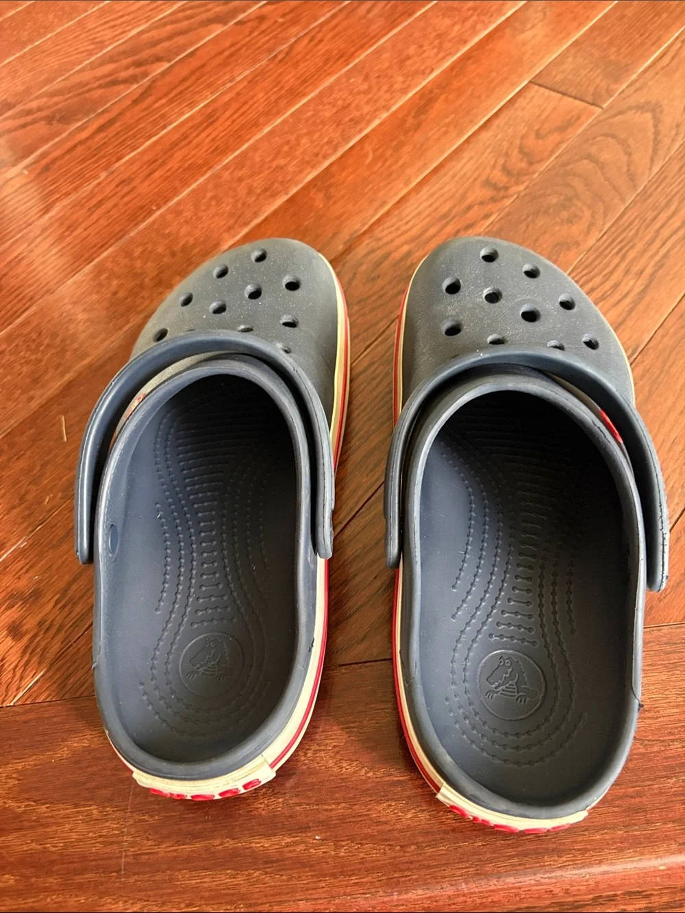 CROCS Kids Navy Clogs with Red and White Trim